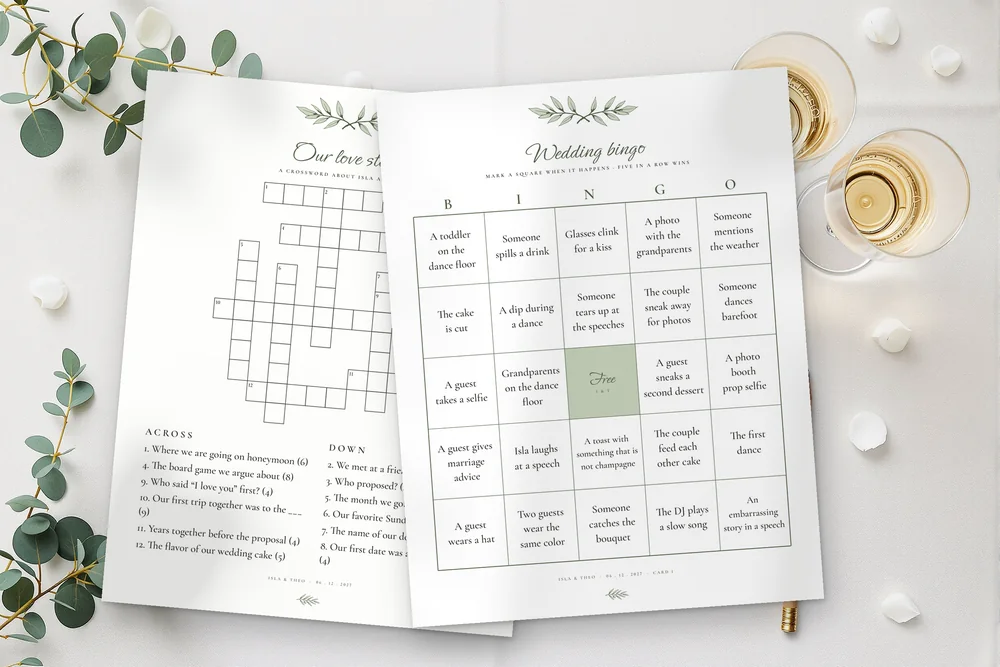 A wedding crossword and a bingo card on a reception table with champagne